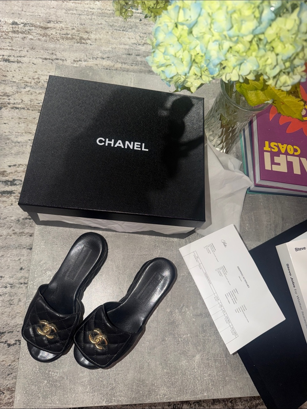 CHANEL Black Quilted Slide Mules with Gold CC Emblem